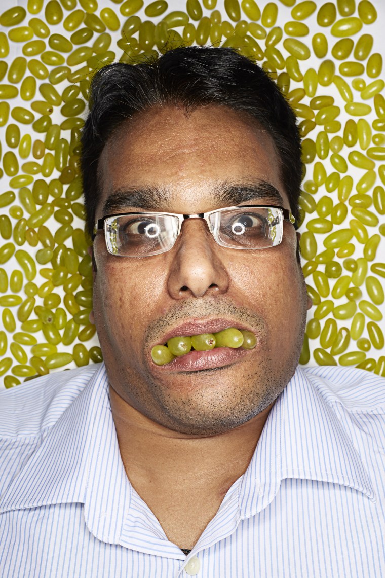 Dinesh Upadhyaya - Most grapes stuffed in the mouth in a minute
Guinness World Records 2014
Photo Credit: Ranald Mackechnie/Guinness World Records